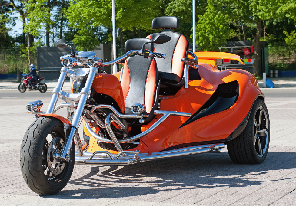 Bild eines orangen Trikes